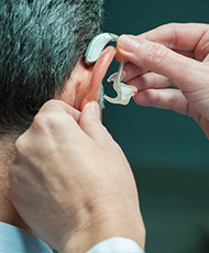 Man getting tinnitus fitting at Hearing & Tinnitus Management, LLC